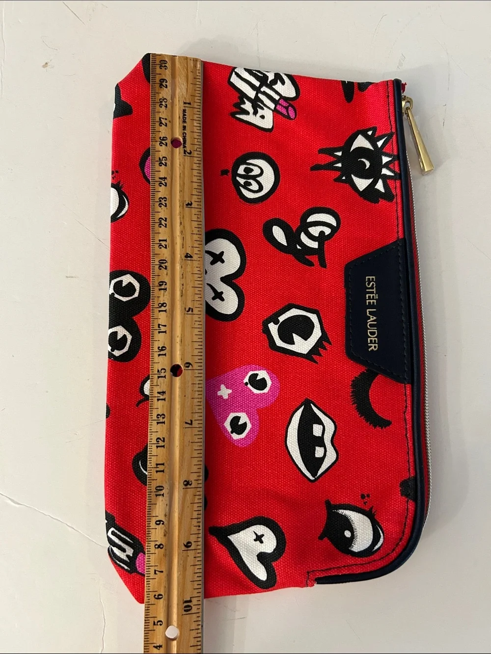 Estée Lauder Red Cosmetic Pouch with beasts, Mickey heads and cute graphics